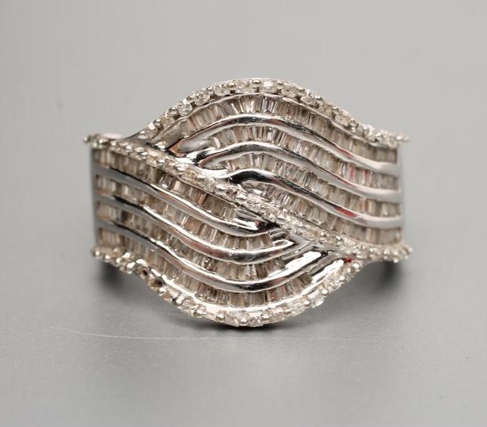 A DIAMOND COCKTAIL RING Image
