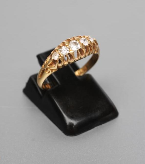 A FIVE STONE DIAMOND RING Image