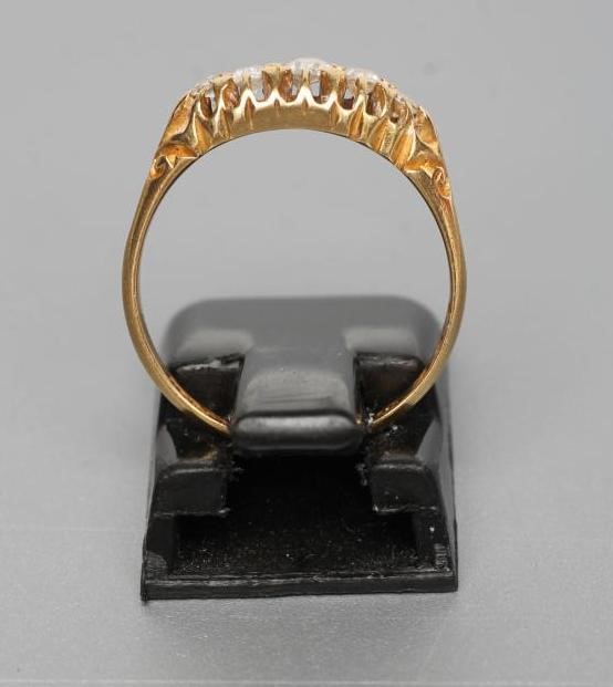 A FIVE STONE DIAMOND RING Image