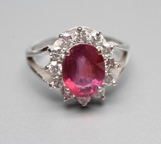 A RUBY AND DIAMOND CLUSTER RING Image