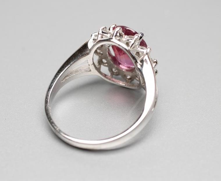 A RUBY AND DIAMOND CLUSTER RING Image