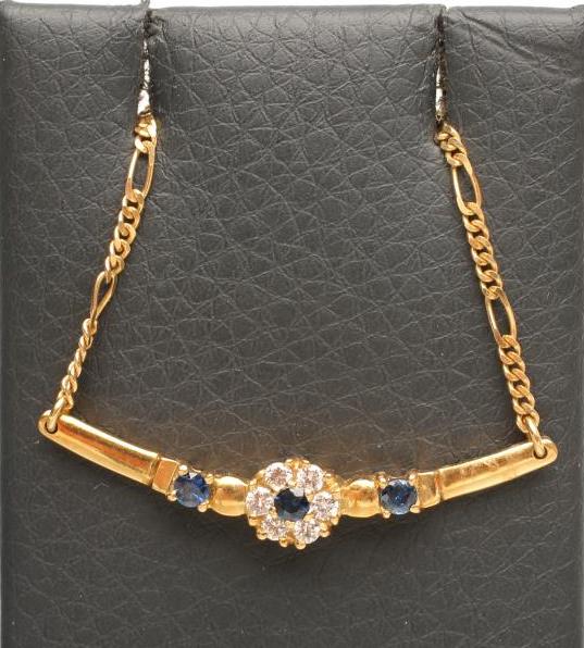 A DIAMOND AND SAPPHIRE NECKLACE Image