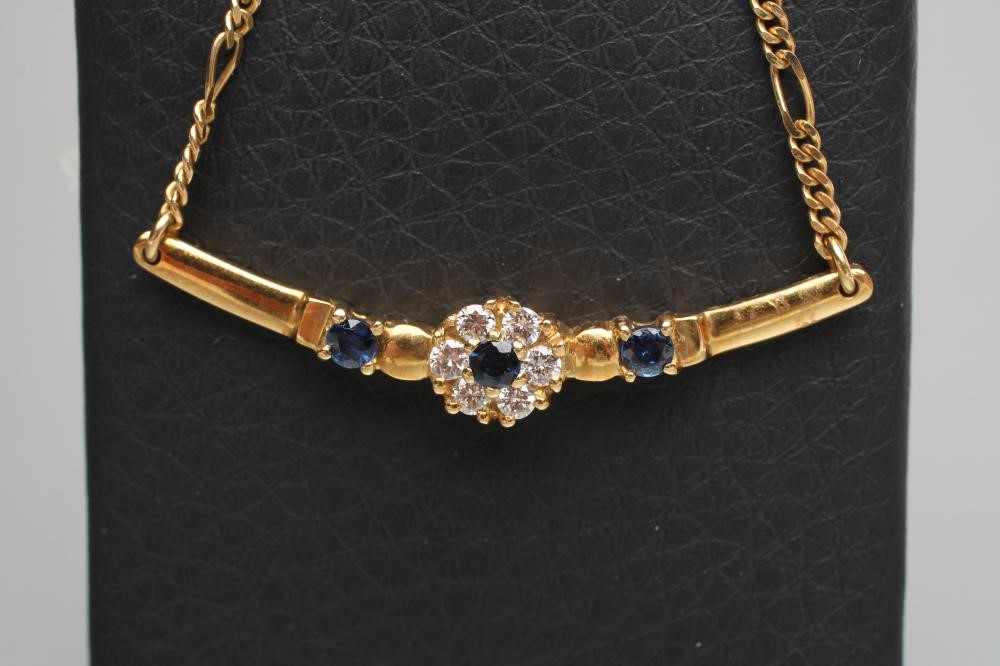 A DIAMOND AND SAPPHIRE NECKLACE Image