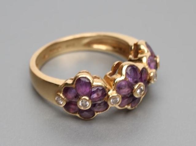 AN AMETHYST AND DIAMOND RING with matching French clip earrings Image