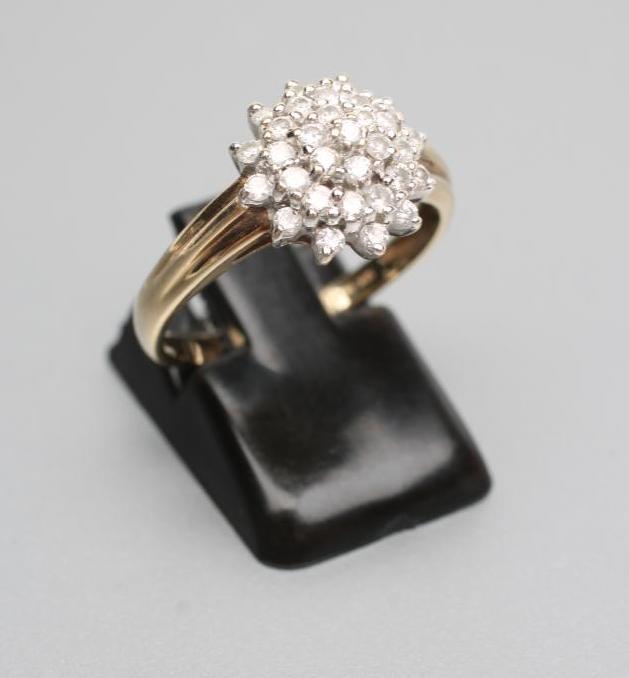 A DIAMOND CLUSTER RING Image