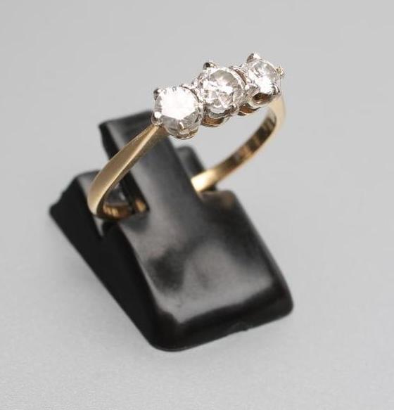 A THREE STONE DIAMOND RING Image