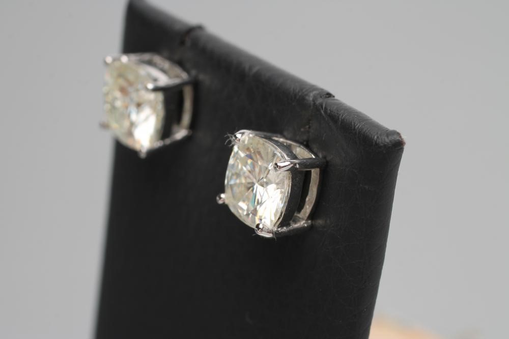 A PAIR OF SOLITAIRE MOISSANITE EAR STUDS Image