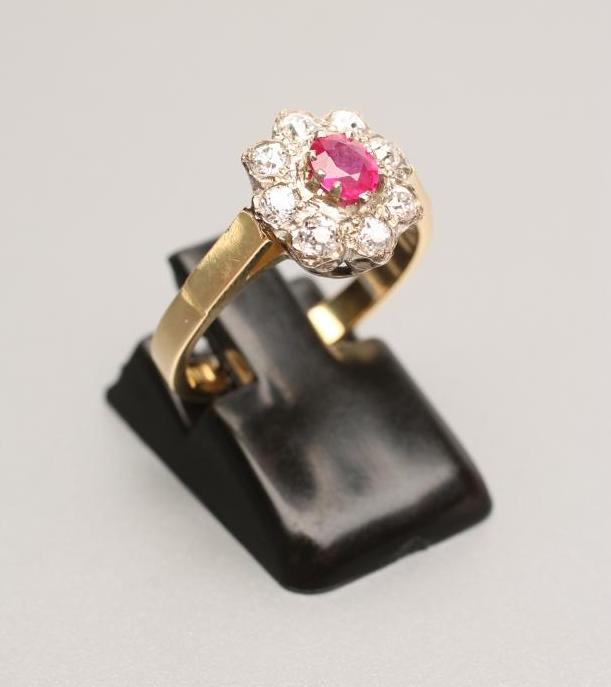 A RUBY AND DIAMOND CLUSTER RING Image