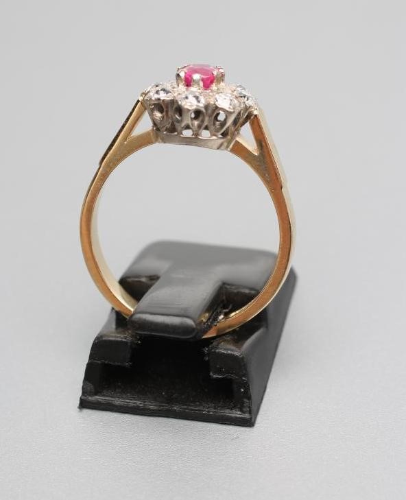 A RUBY AND DIAMOND CLUSTER RING Image