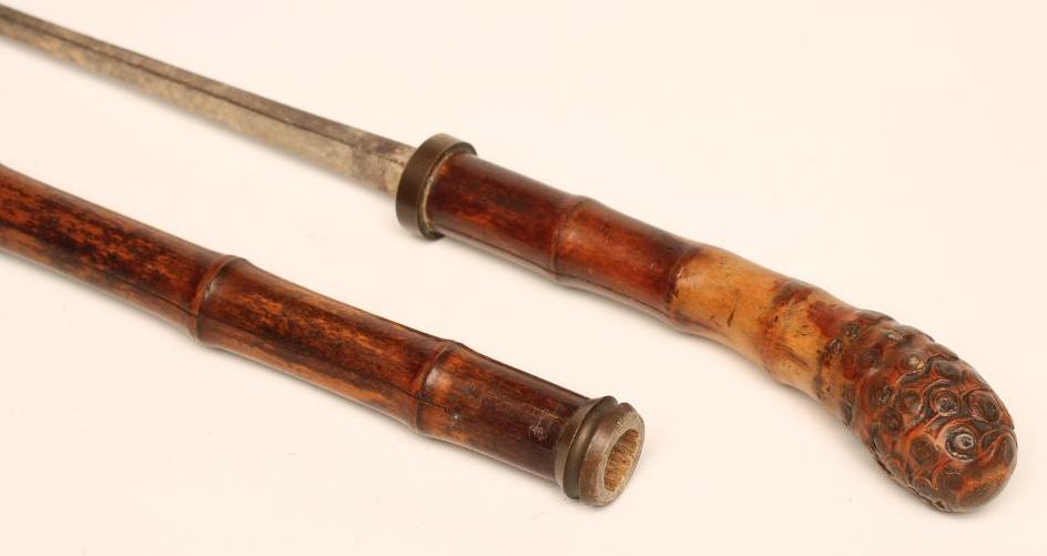A SWORD STICK of bamboo construction with 20 1/2" square section steel blade Image