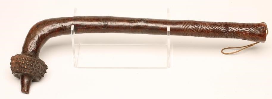 A FIJIAN TOTOKIA WAR CLUB with chevron carved grip and typical pineapple carved head Image