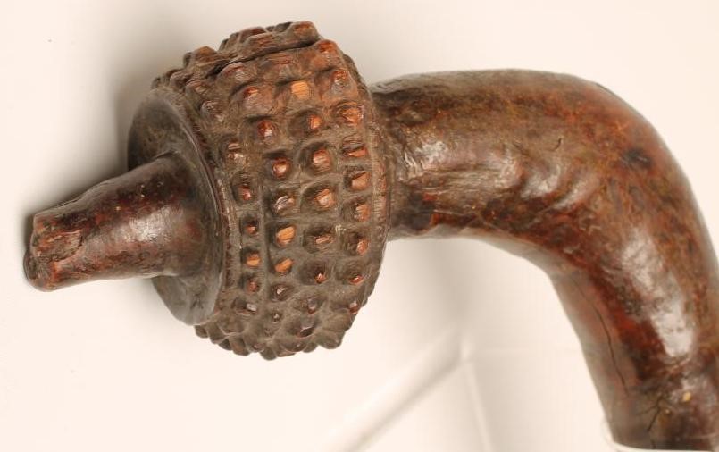 A FIJIAN TOTOKIA WAR CLUB with chevron carved grip and typical pineapple carved head Image