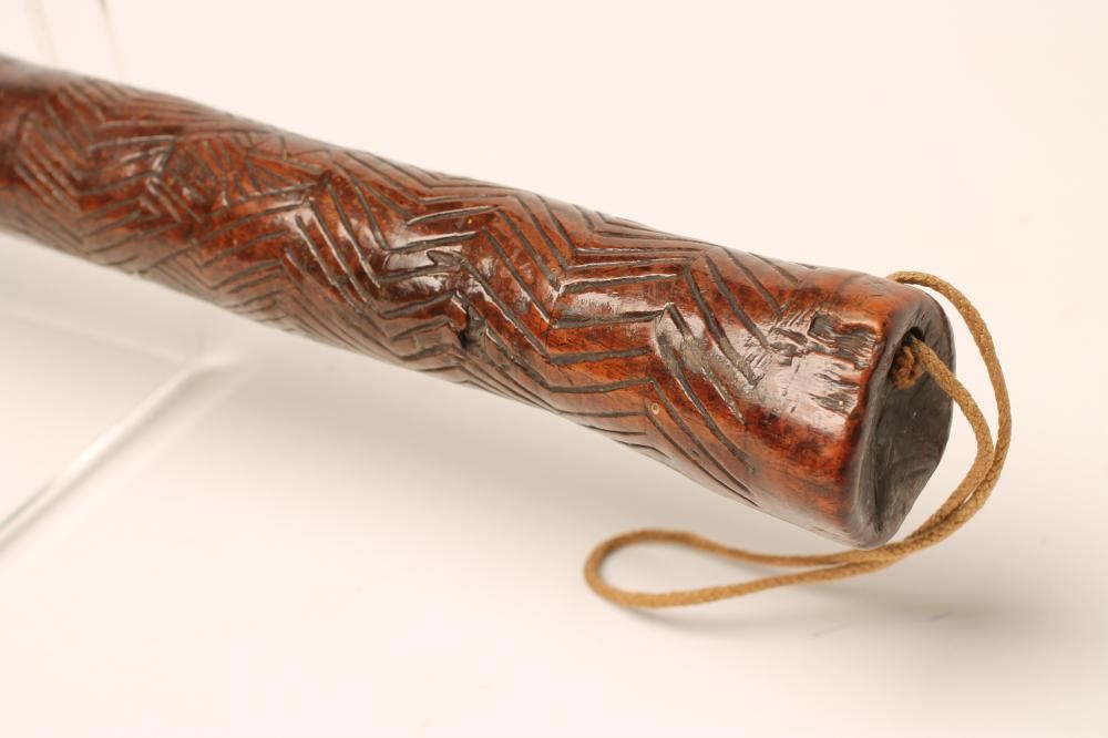 A FIJIAN TOTOKIA WAR CLUB with chevron carved grip and typical pineapple carved head Image