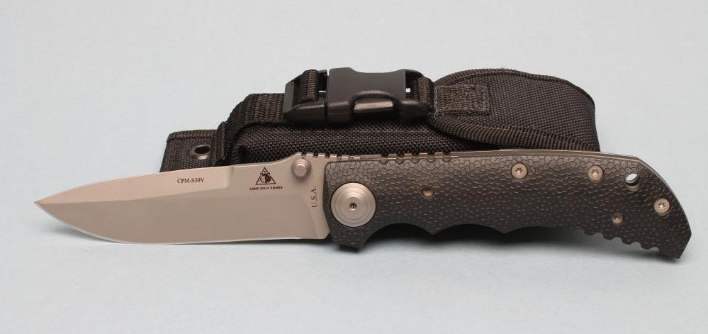 A LONE WOLF FOLDING LOCK KNIFE Image
