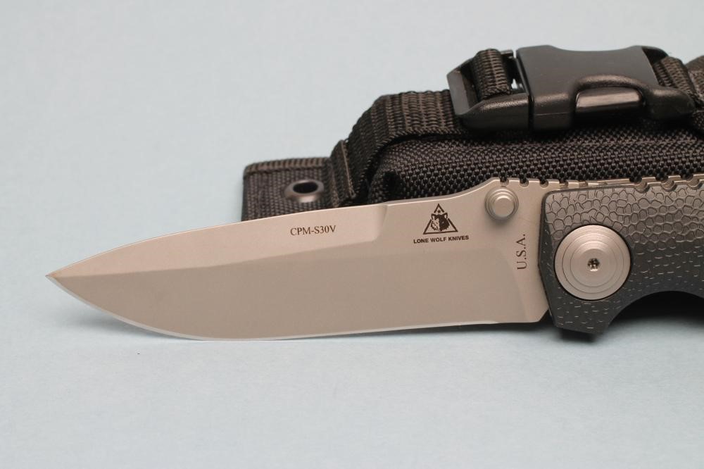 A LONE WOLF FOLDING LOCK KNIFE Image