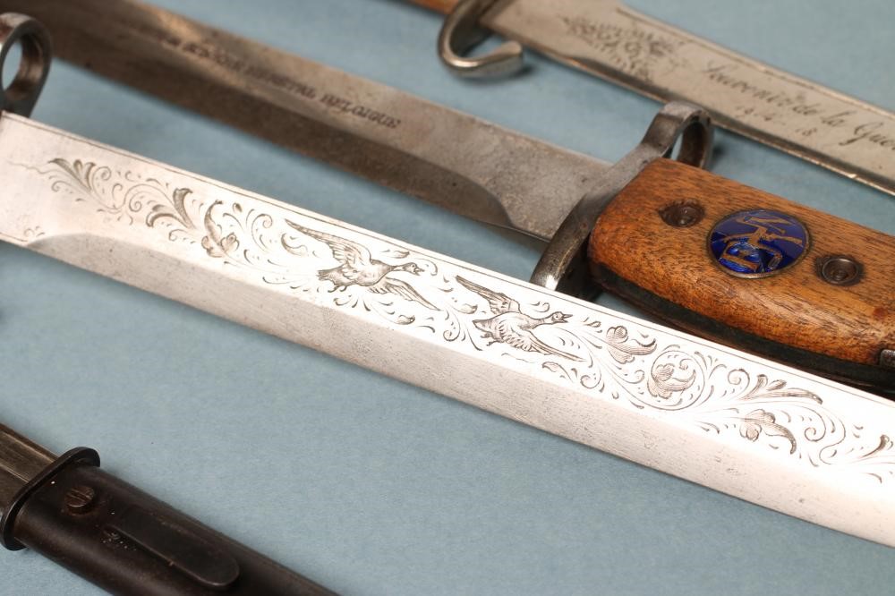 FOUR BELGIAN SOUVENIR MINIATURE BAYONETS Image