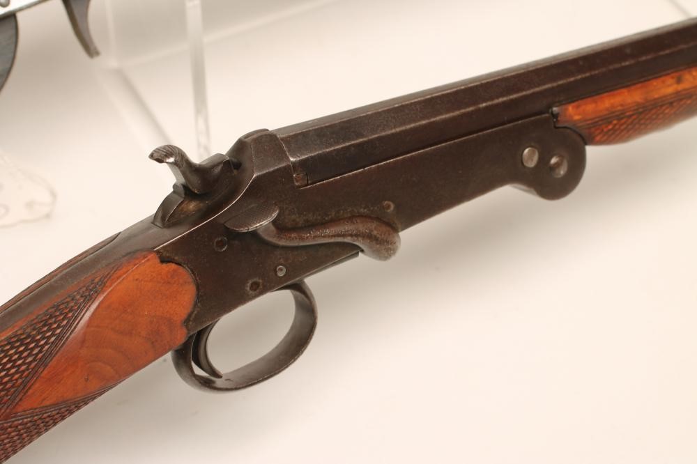 TWO FOLDING SHOTGUNS Image