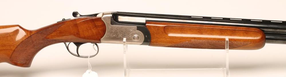 A 12 BORE OVER AND UNDER SHOTGUN by Sarriugarte-Elgoibar Image