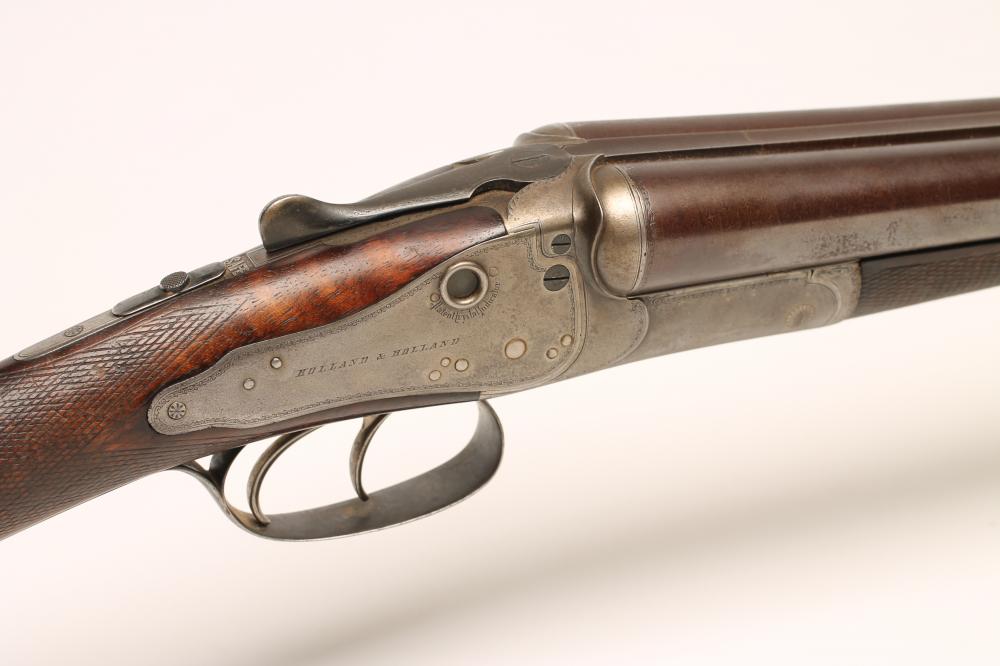 A HOLLAND & HOLLAND BACK-ACTION SIDELOCK 12 BORE SHOTGUN Image