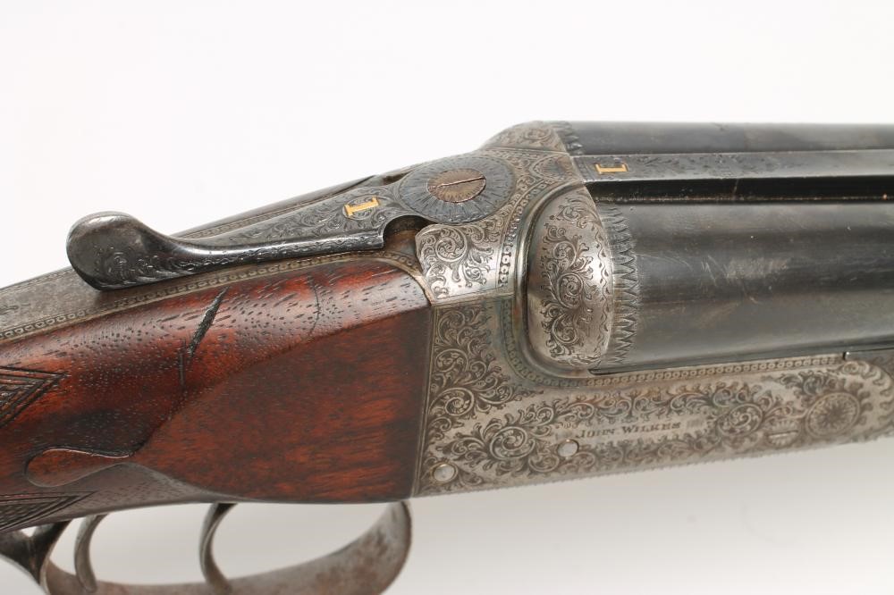 A 28 BORE SIDE BY SIDE BOXLOCK EJECTOR SHOTGUN by John Wilkes Image
