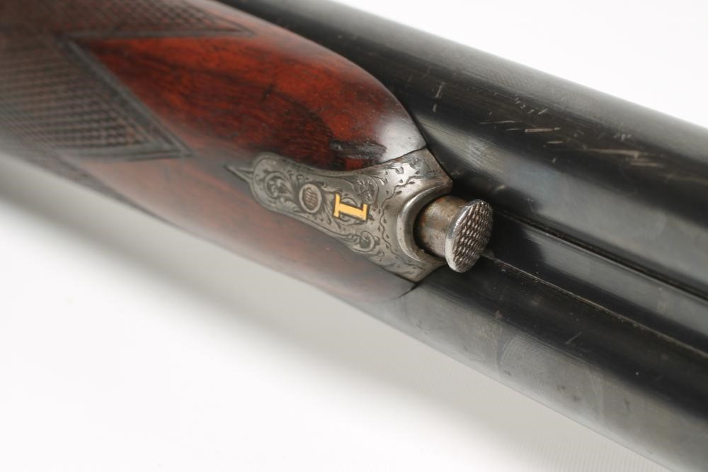 A 28 BORE SIDE BY SIDE BOXLOCK EJECTOR SHOTGUN by John Wilkes Image