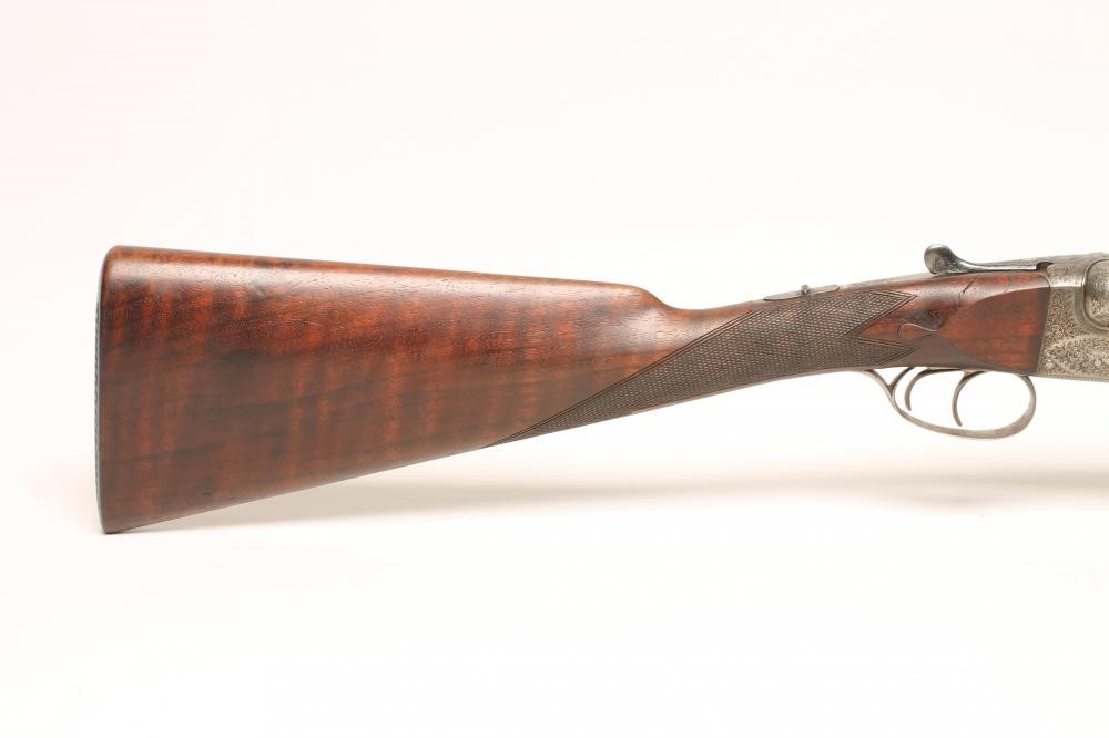 A 28 BORE SIDE BY SIDE BOXLOCK EJECTOR SHOTGUN by John Wilkes Image