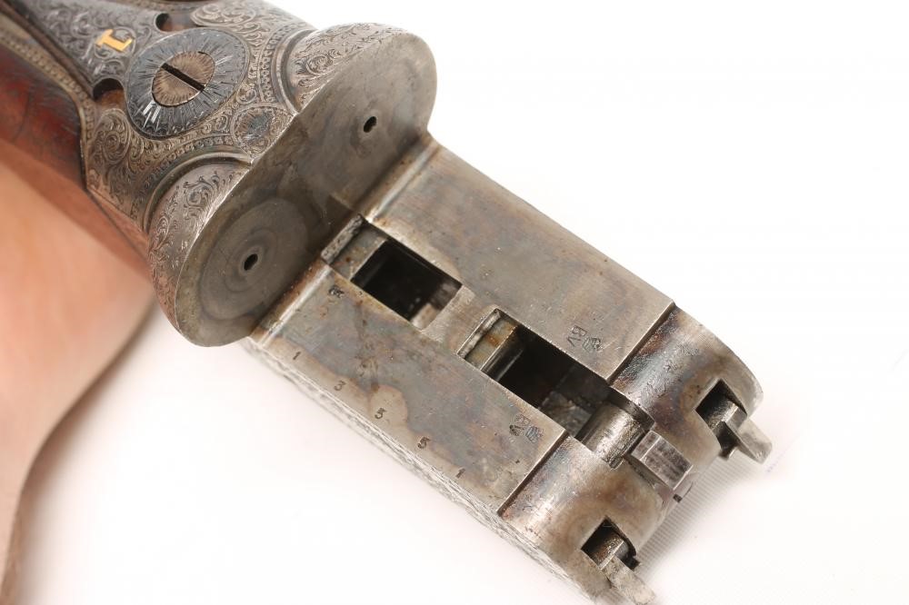 A 28 BORE SIDE BY SIDE BOXLOCK EJECTOR SHOTGUN by John Wilkes Image