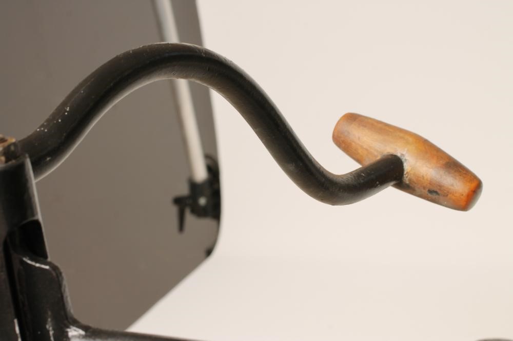 A PENNY FARTHING BICYCLE with stamped metal seat Image