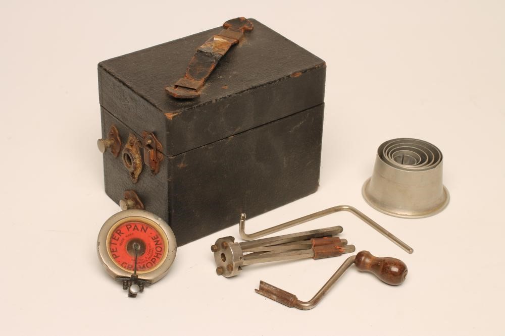 A PETER PAN GRAMOPHONE with folding record platform and collapsing alloy horn Image