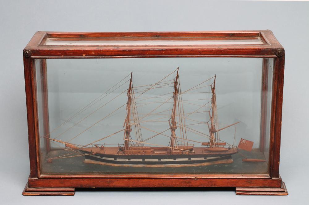 A WOODEN SCALE MODEL OF A BRITISH THREE MASTED SLOOP Image