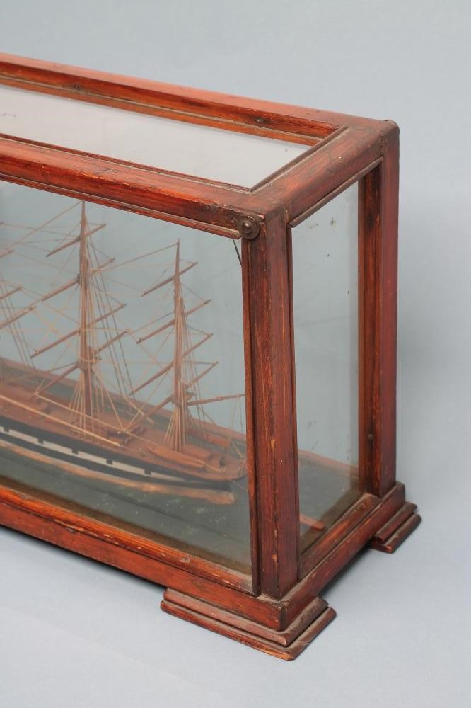 A WOODEN SCALE MODEL OF A BRITISH THREE MASTED SLOOP Image