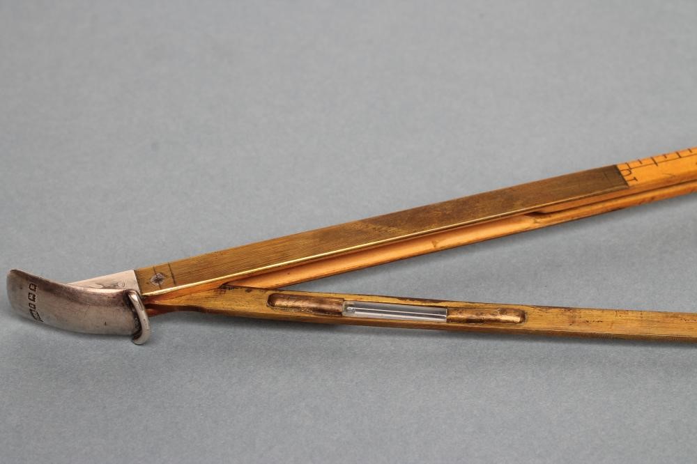 A SILVER MOUNTED HORSE MEASURING WALKING CANE by Swaine & Adeney Image