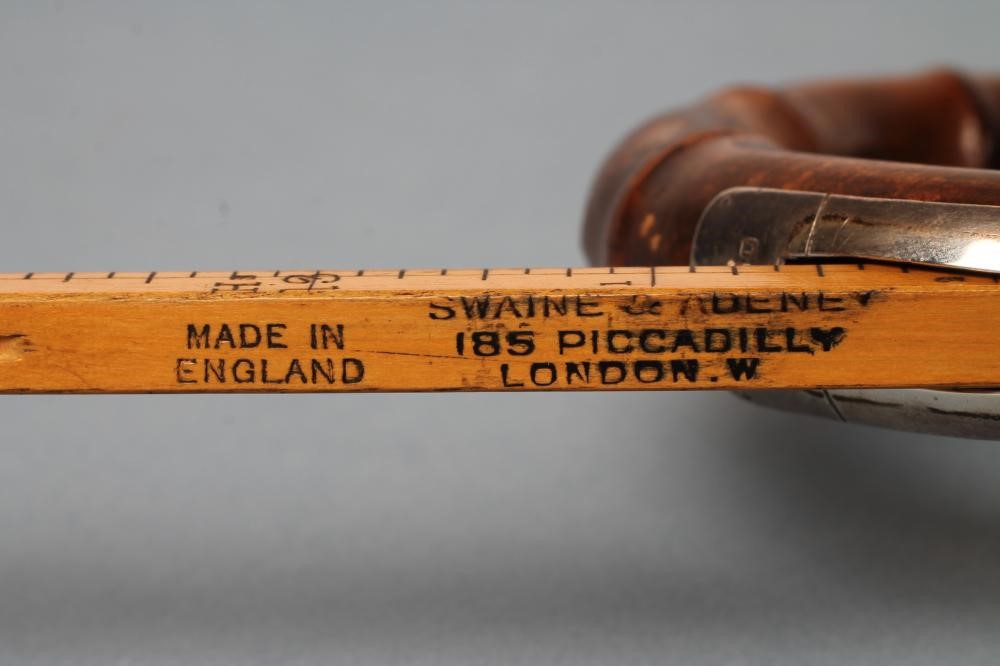 A SILVER MOUNTED HORSE MEASURING WALKING CANE by Swaine & Adeney Image