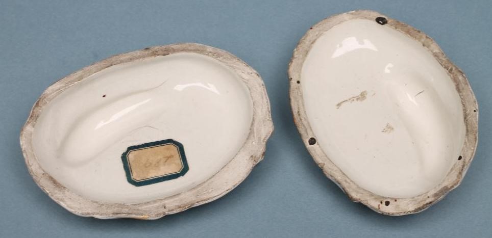 A PAIR OF STAFFORDSHIRE POTTERY GREYHOUNDS Image