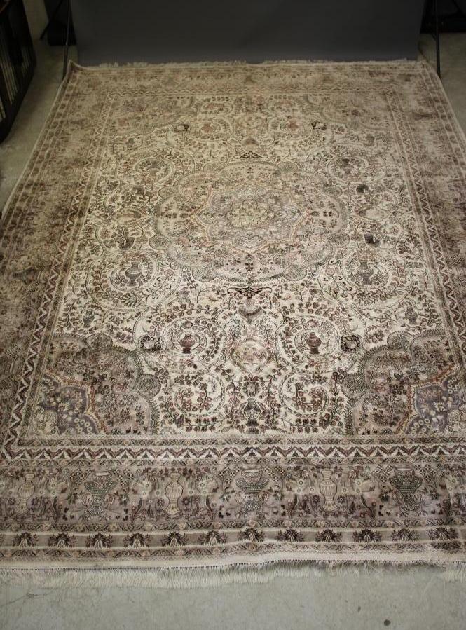 A persian carpet Hartleys Auctioneers & Valuers