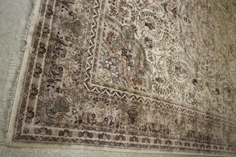 A persian carpet Hartleys Auctioneers & Valuers