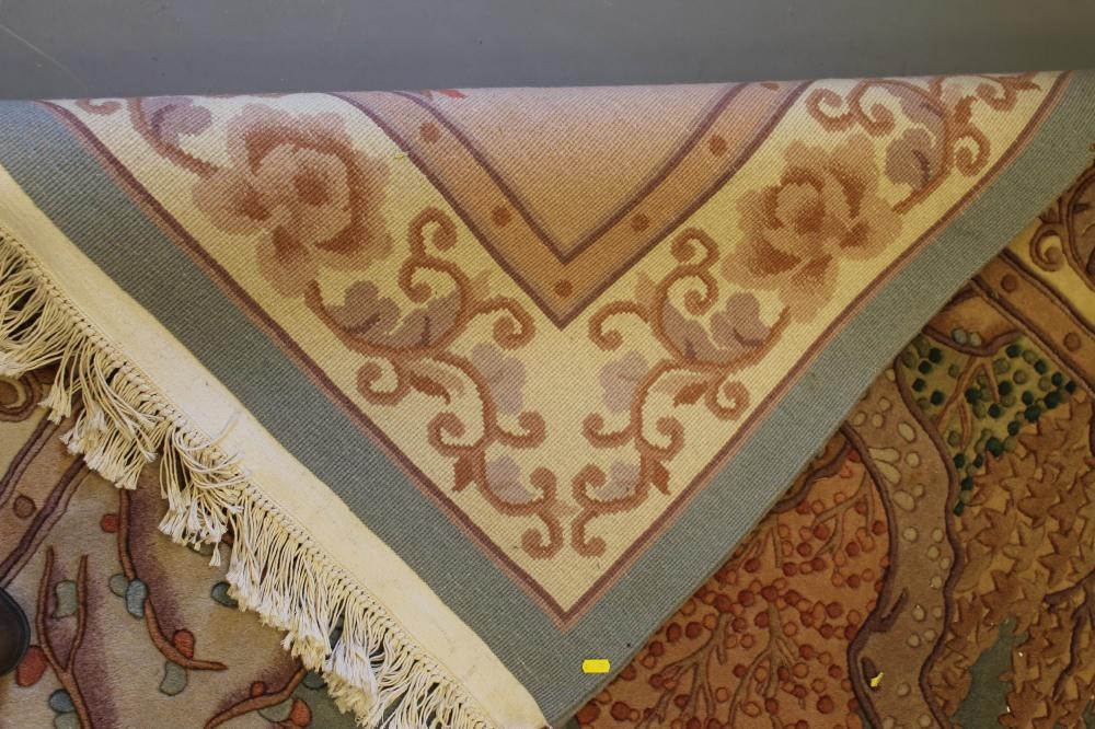 A CHINESE PICTORIAL WASHED AND FRINGED SILK RUG Image