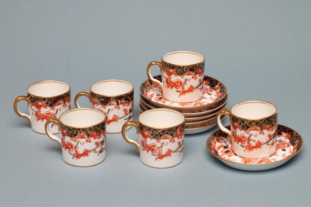 A SET OF SIX ROYAL CROWN DERBY CHINA COFFEE CANS AND SAUCERS Image