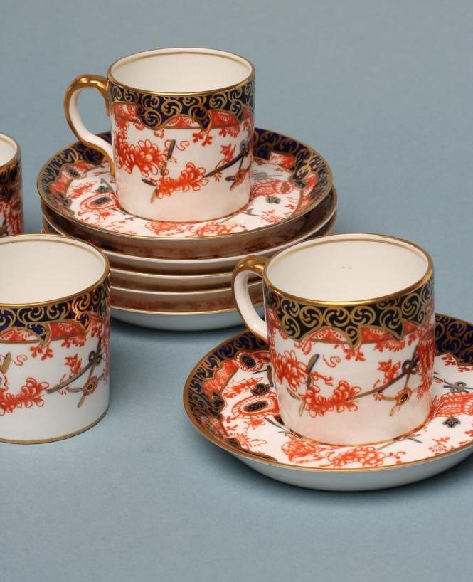 A SET OF SIX ROYAL CROWN DERBY CHINA COFFEE CANS AND SAUCERS Image