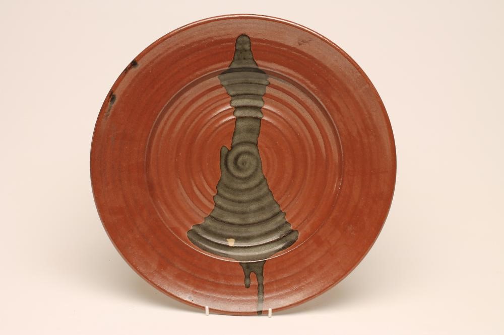 MICHAEL COLE (Contemporary) -  A studio stoneware tenmoko glazed charger of plain ribbed circular Image