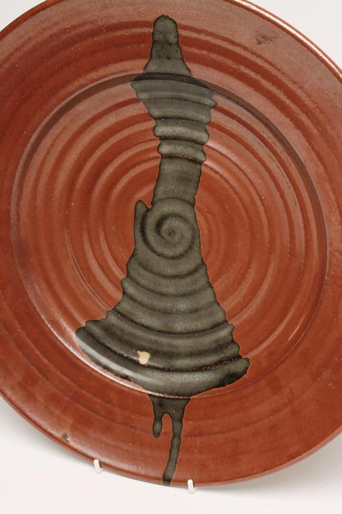 MICHAEL COLE (Contemporary) -  A studio stoneware tenmoko glazed charger of plain ribbed circular Image