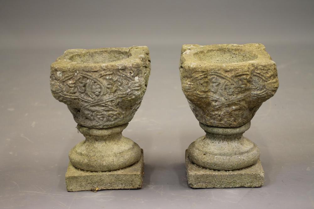 A PAIR OF COMPOSITION STONE JARDINIERES Image