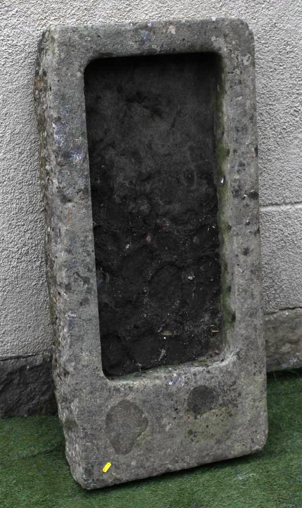 A SANDSTONE SINK of shallow rounded oblong form Image