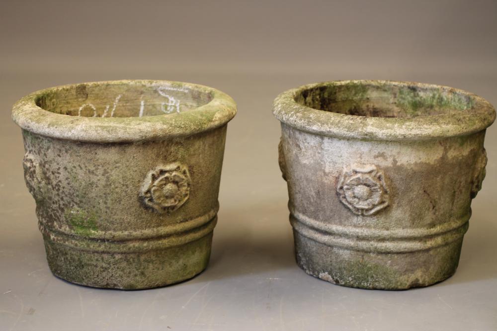 A PAIR OF COMPOSITION STONE PLANTERS of circular tapering form Image