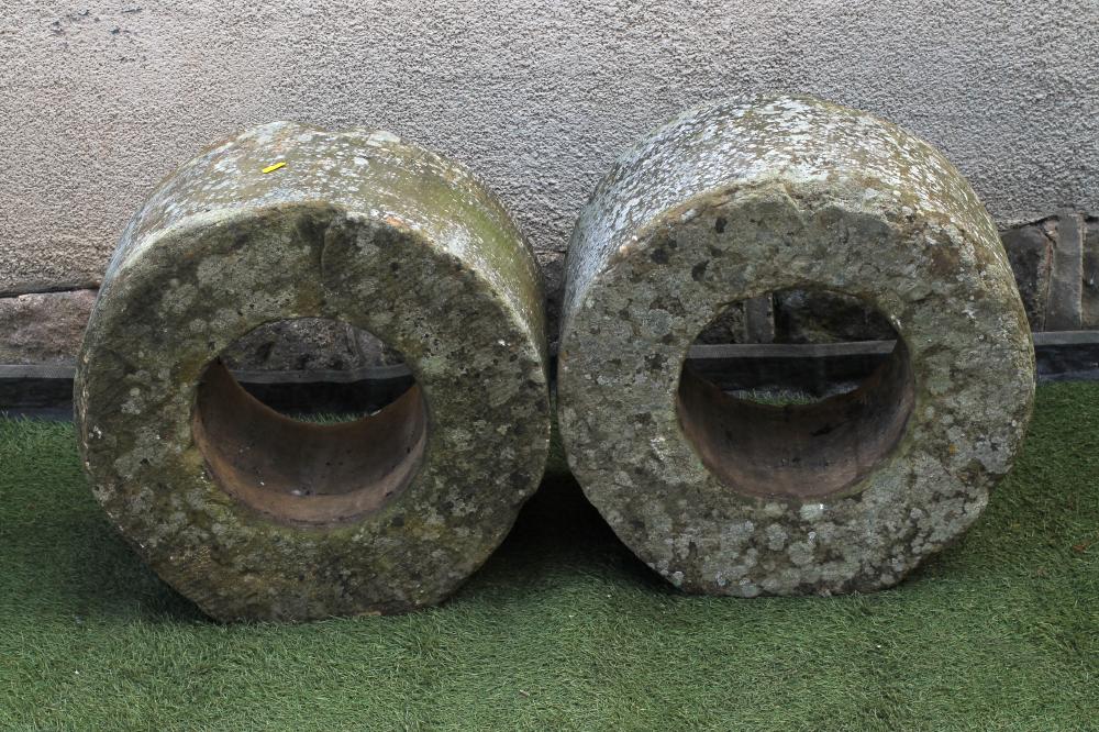 A PAIR OF CIRCULAR STONE JARDINIERES Image