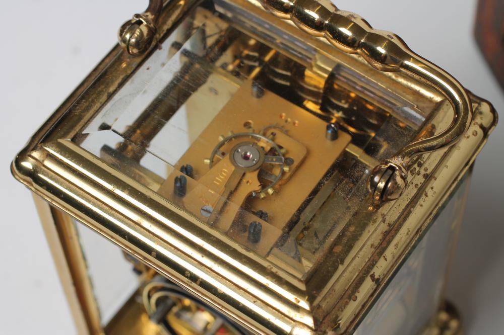 A GILDED BRASS CASED CARRIAGE CLOCK Image