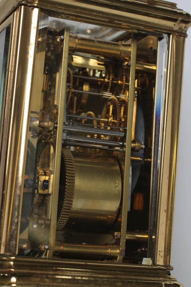 A GILDED BRASS CASED CARRIAGE CLOCK Image