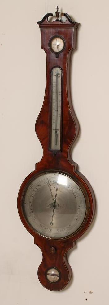 A MAHOGANY CASED WHEEL BAROMETER by A Jarone(?) Image