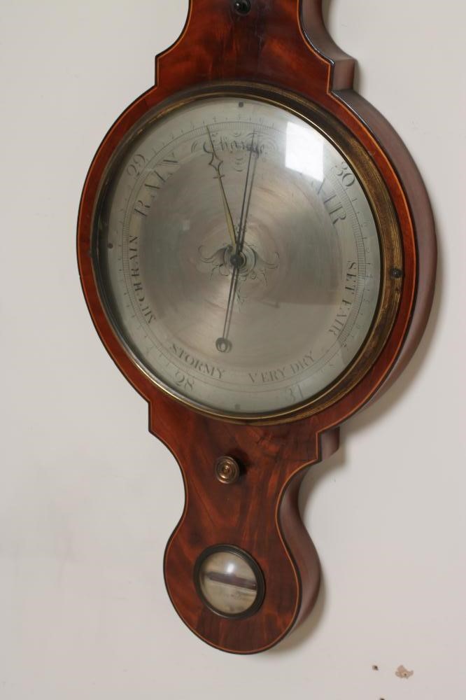 A MAHOGANY CASED WHEEL BAROMETER by A Jarone(?) Image