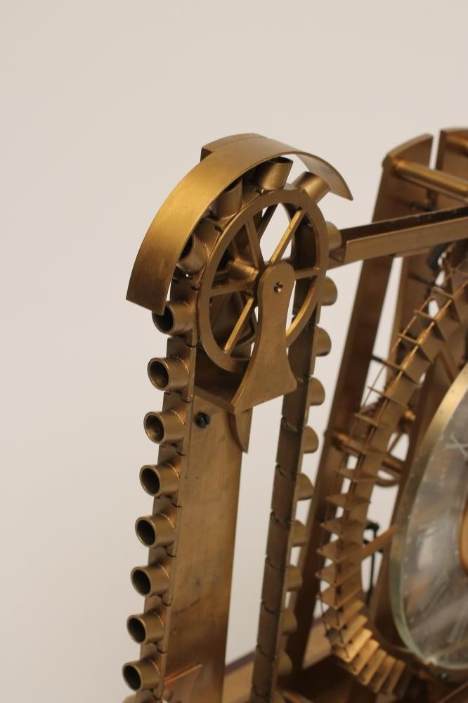 A BRASS WATER WHEEL INDUSTRIAL CLOCK Image